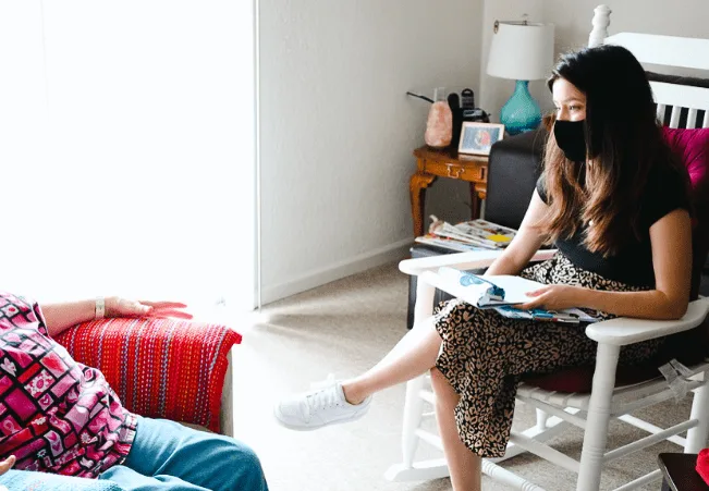 Researcher conducting a contextual interview in a participant’s home