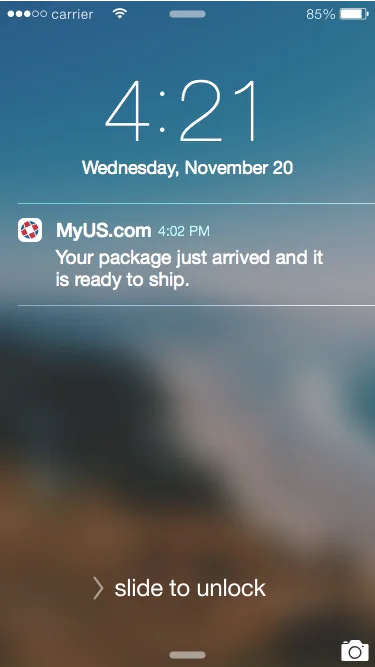 iPhone lock screen showing a MyUS.com push notification reading Your package just arrived and it is ready to ship