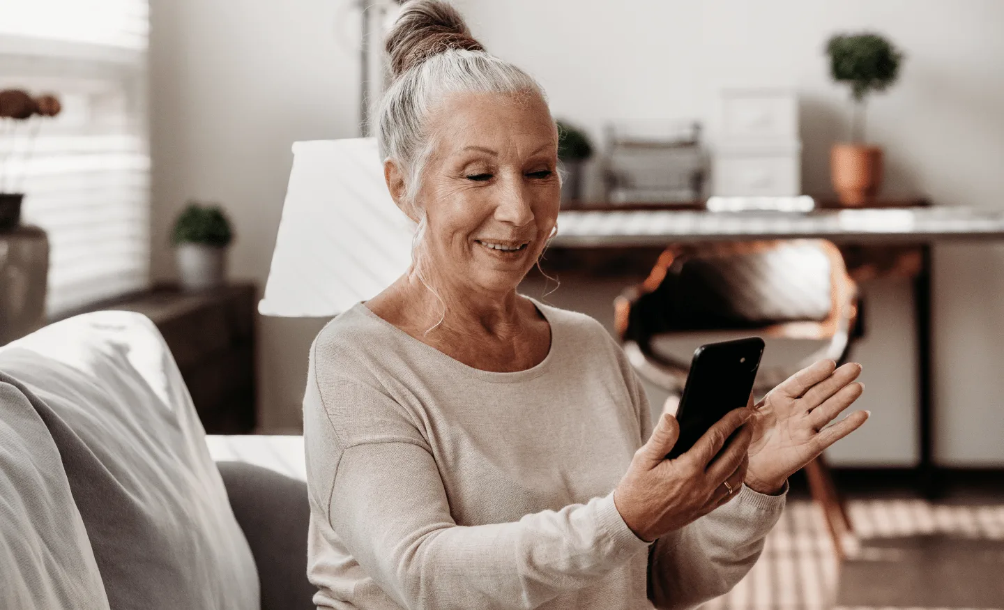 Elderly woman using healthcare app