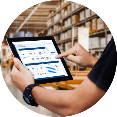 Manager using logistics app in a warehouse